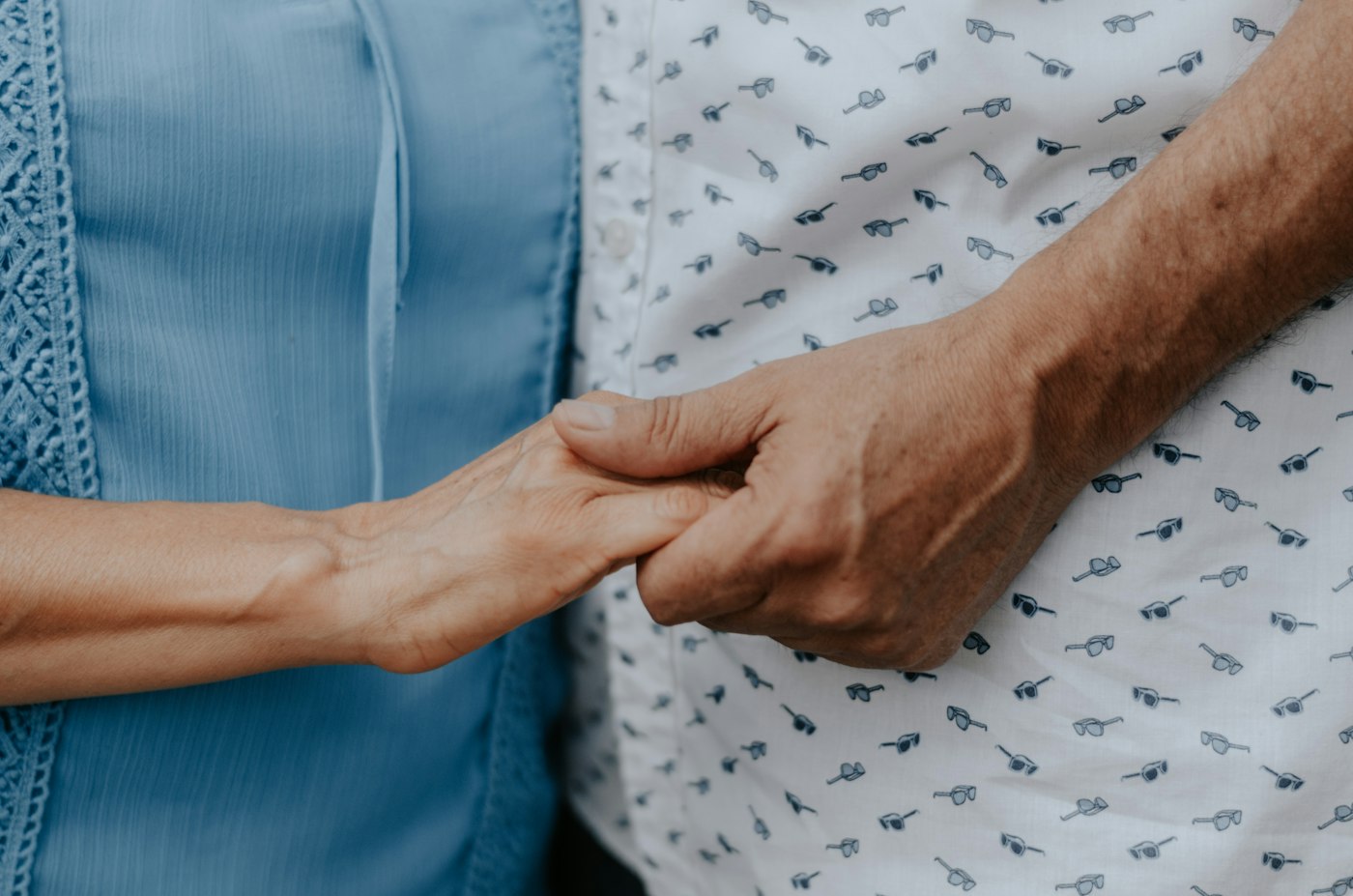 Holding hands in support
